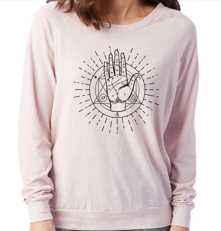 Rose Quartz tri-blend  sweatshirt with black Palmistry print at front, on a female model.