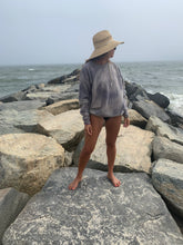 Load image into Gallery viewer, Cozy Tie Dyed Unisex Sweatshirt on a woman at the beach
